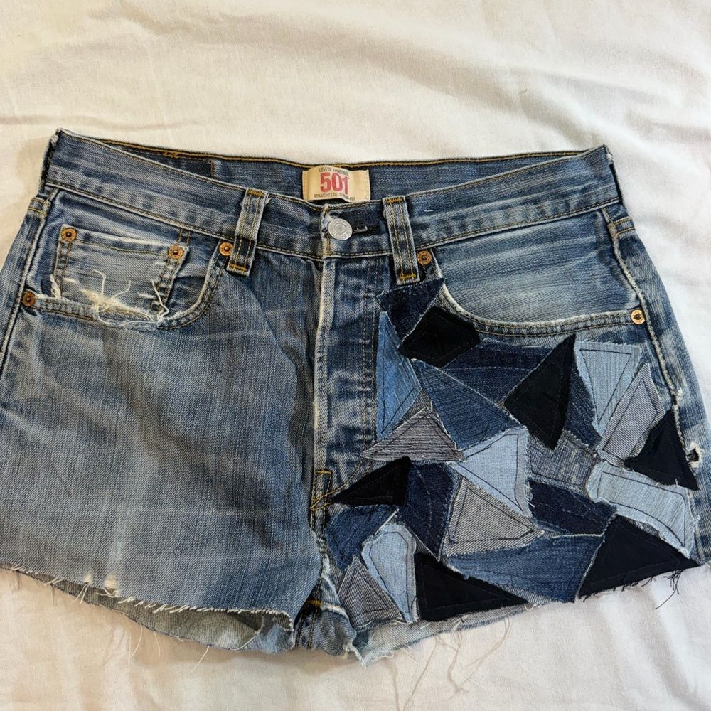 Levi's denim shorts with blue patchwork triangles size 31